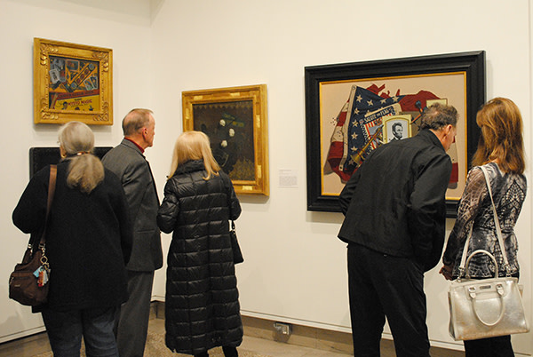 People watching art pieces at Heckscher Museum of Art