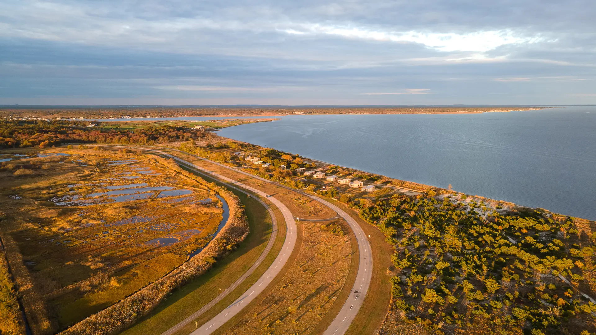 Heckscher State Park coastline under a golden sunset light