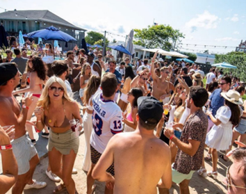 Guests enjoying a sunny day event at Montauk Beach House