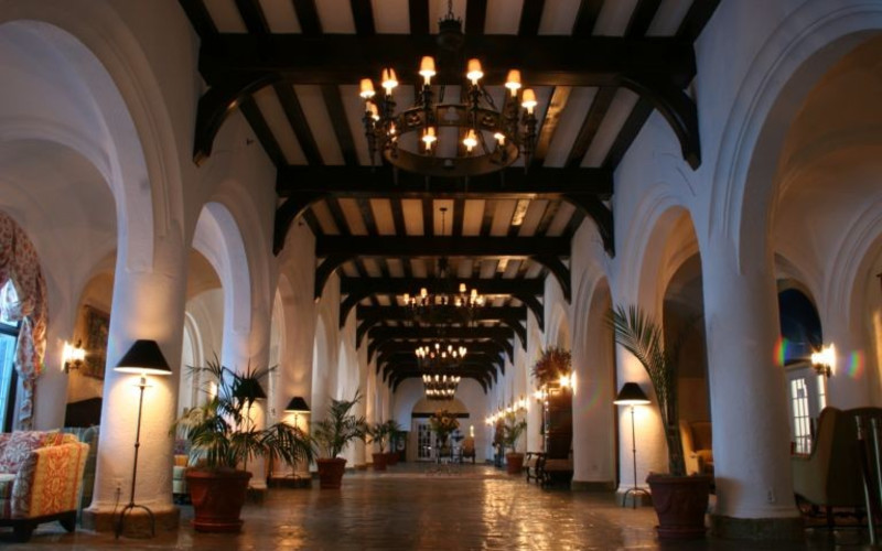 Montauk Manor grand hall illuminated by warm lighting