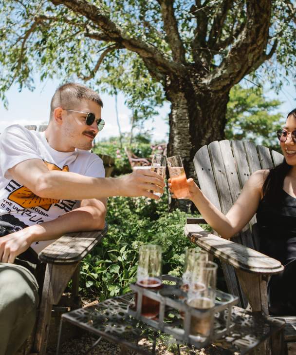 Couple cheersing on a romantic afternoon on Long Island