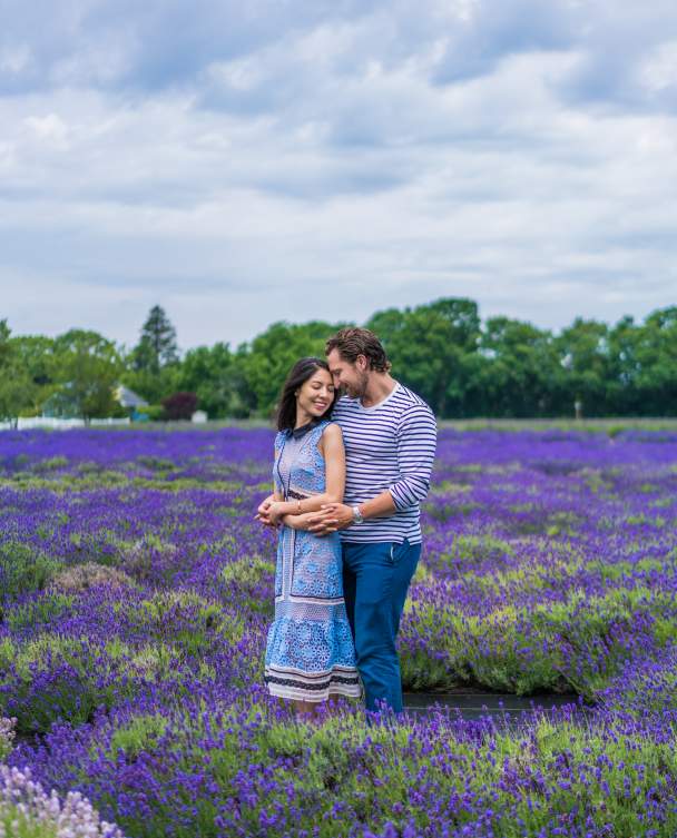 Couple enjoying the lavender bloom on Long Island