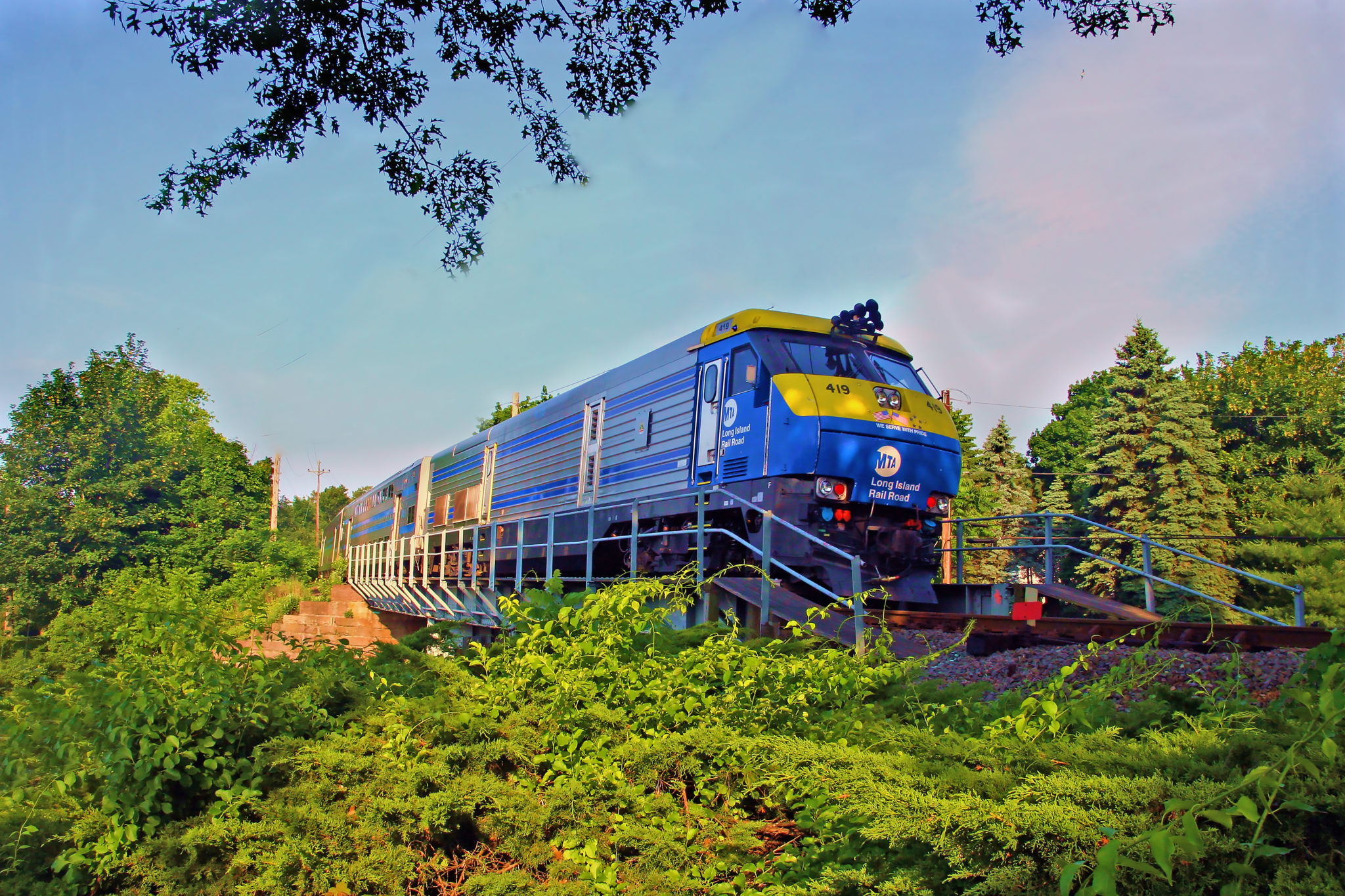 Long Island Rail Road train traveling through the countryside