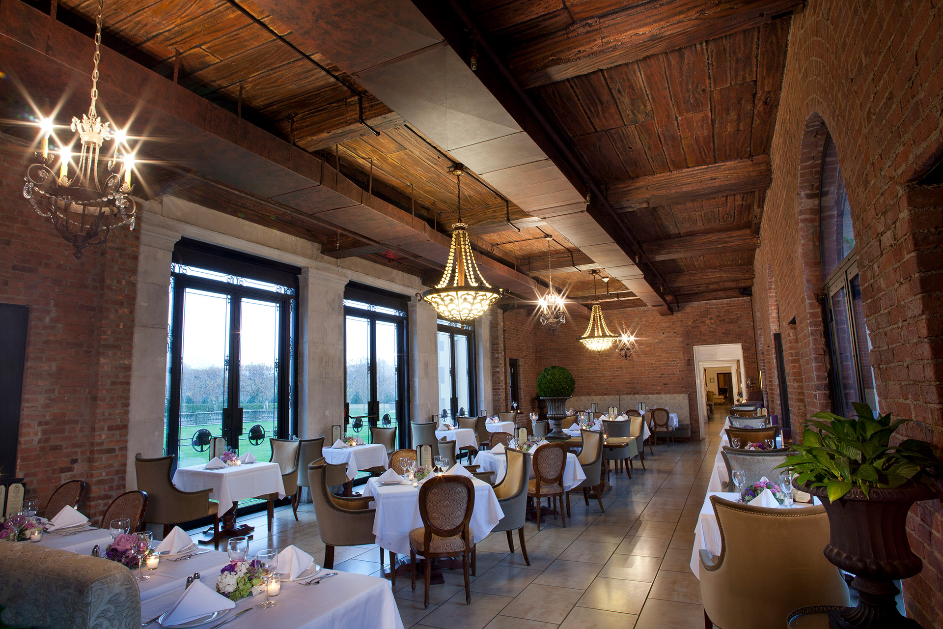Elegant dining room with chandeliers at Oheka Castle on Long Island