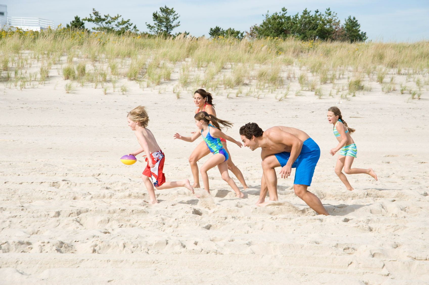 Children playing on a Long Island beach