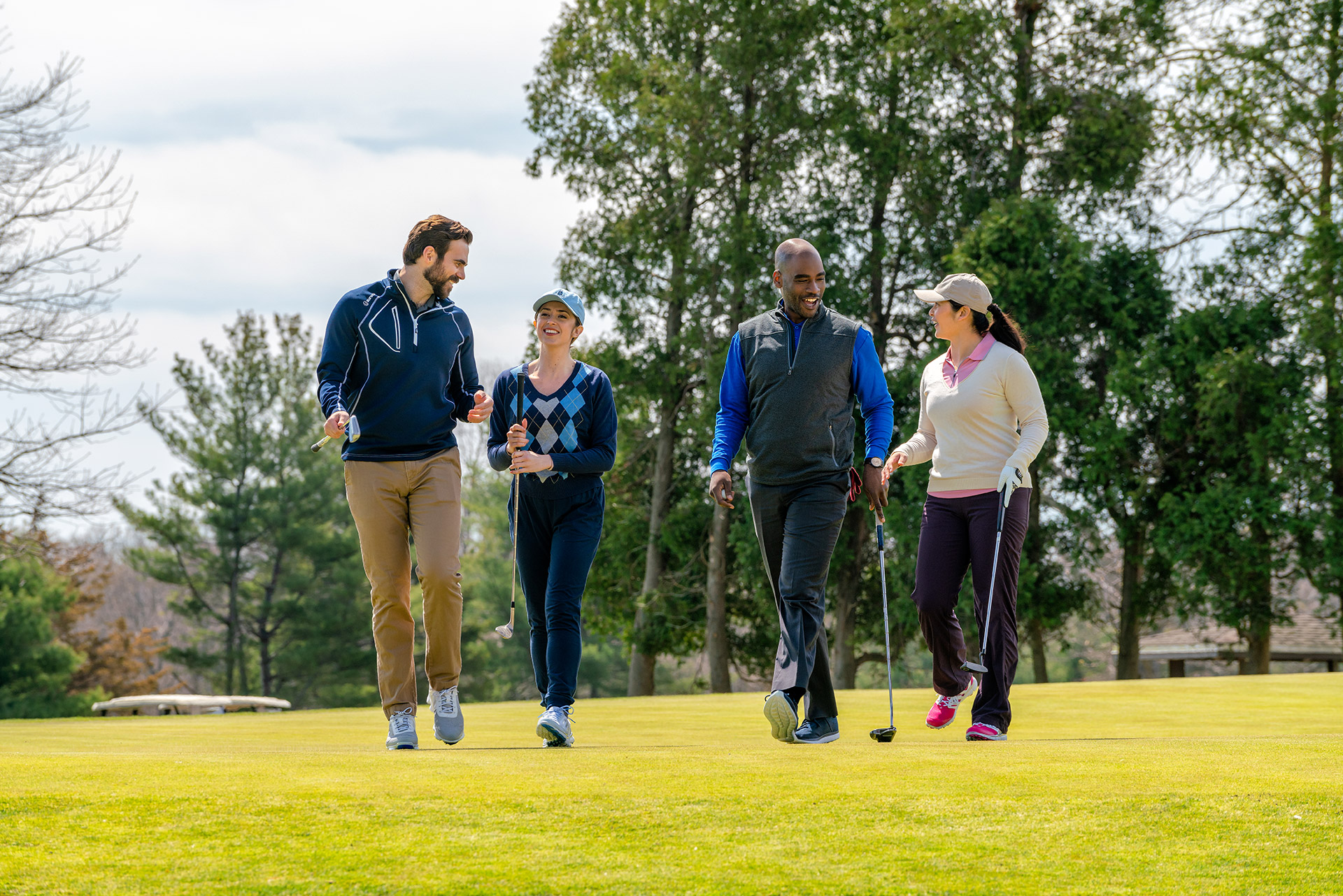 Group walking the fairway at Sunken Meadow State Park golf course, Long Island