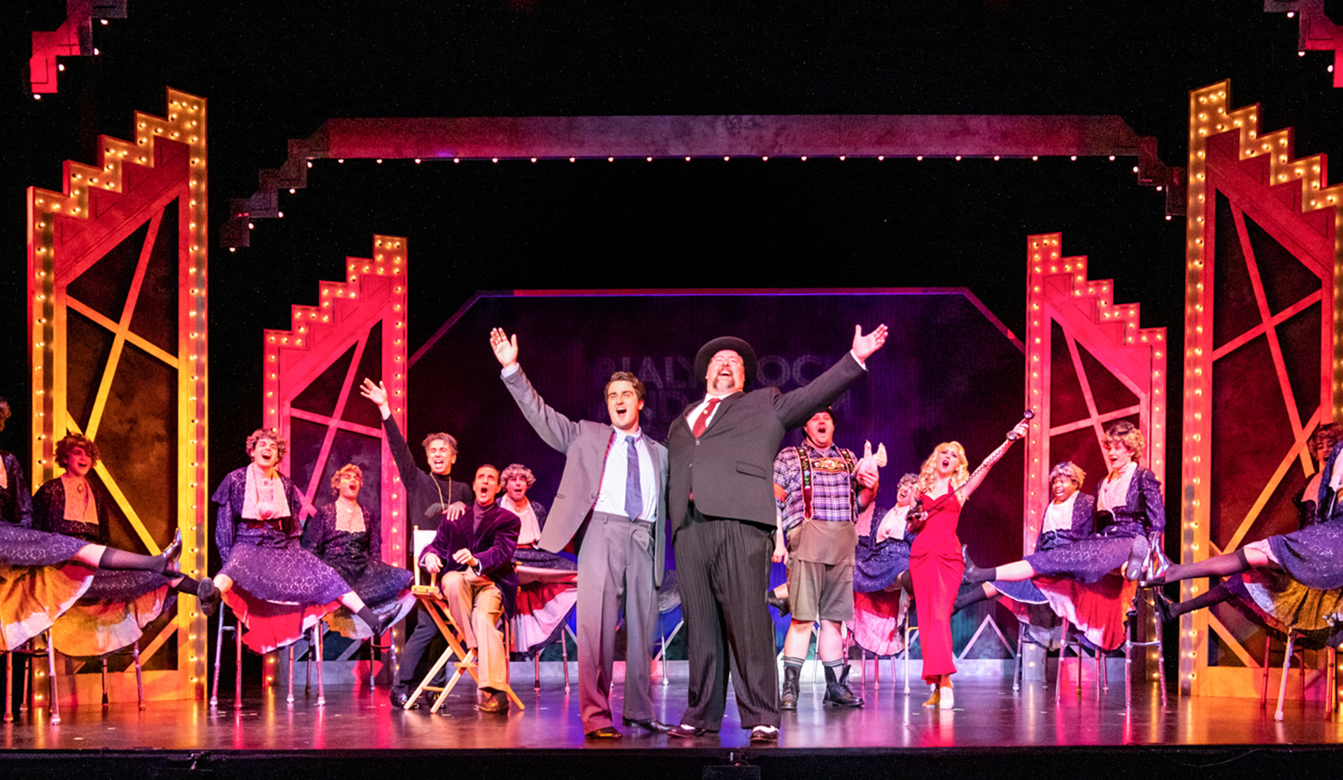 Cast performing 'The Producers' musical on a Long Island stage