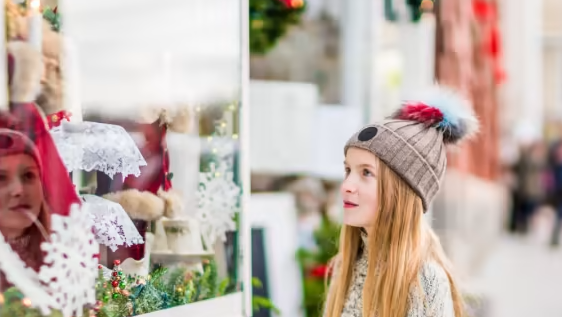 Shoppers in winter fashion on a Long Island Main Street