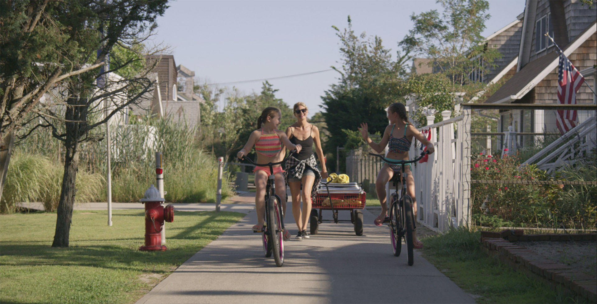 Friends biking through a Long Island farm trail