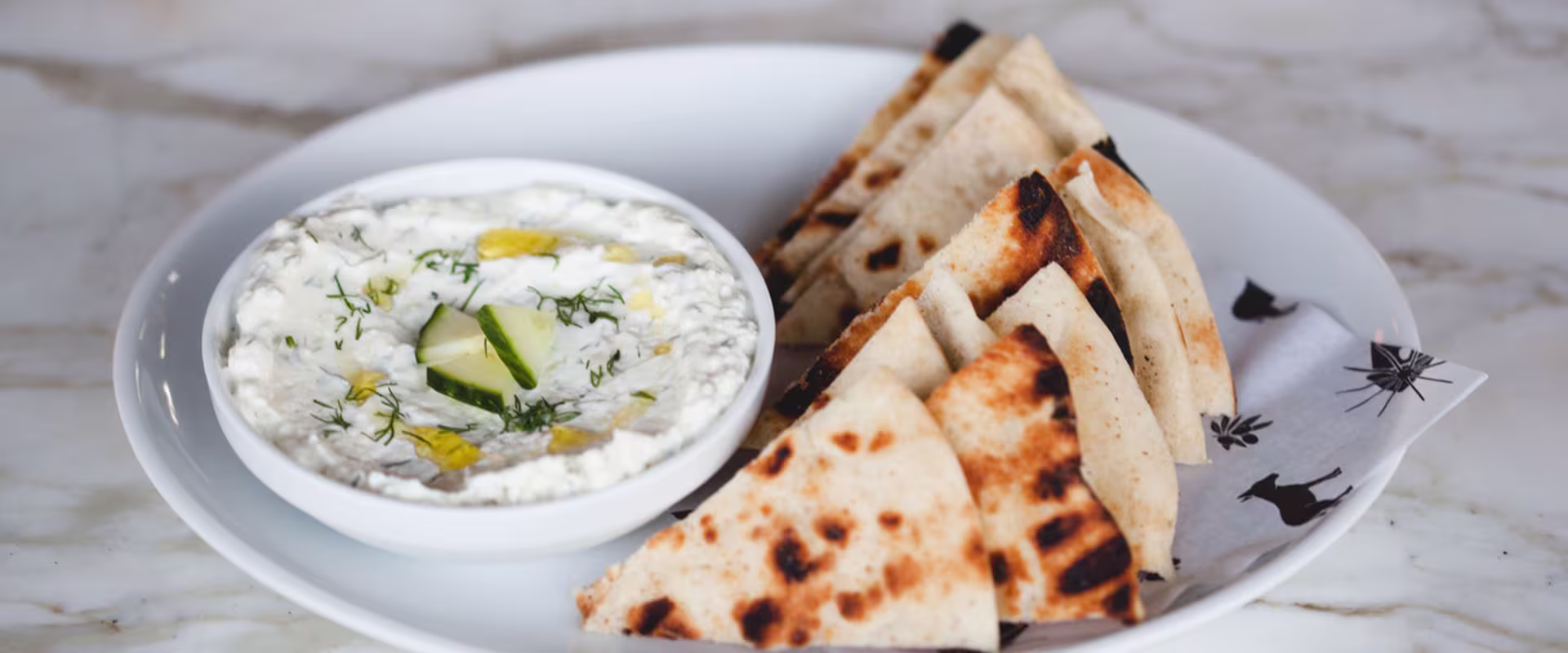 Greek food served in restaurant on Long Island