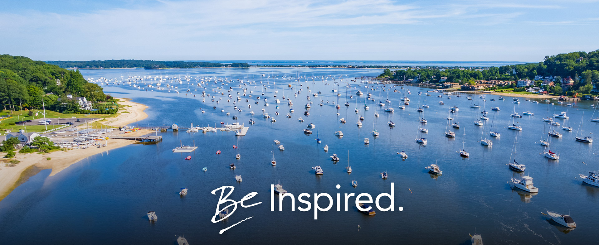 Aerial harbor view promoting Long Island travel inspiration