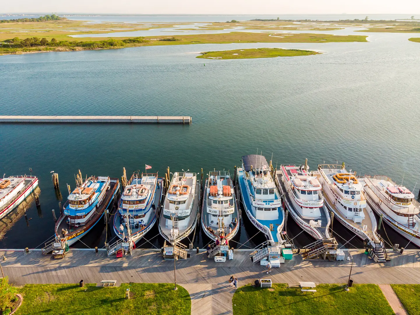 Aerial view of tour boats docked at a Long Island marina