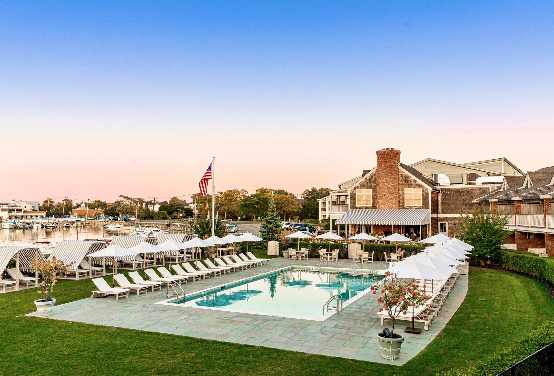 Aerial view of a resort pool at dusk in the Hamptons, Long Island