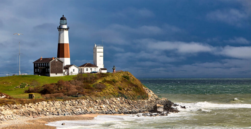Montauk Point Lighthouse overlooking the rocky coast, Long Island