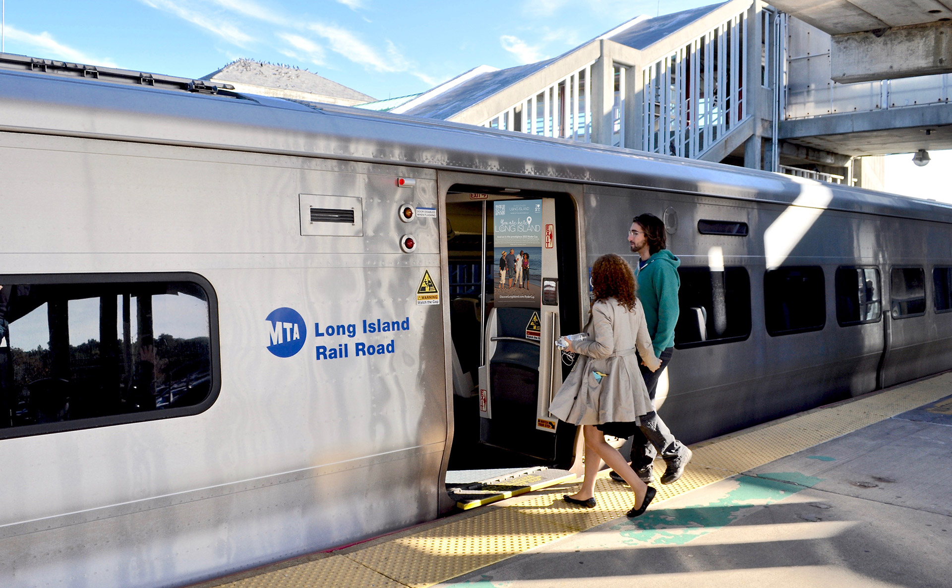 Passengers boarding a Long Island Rail Road train